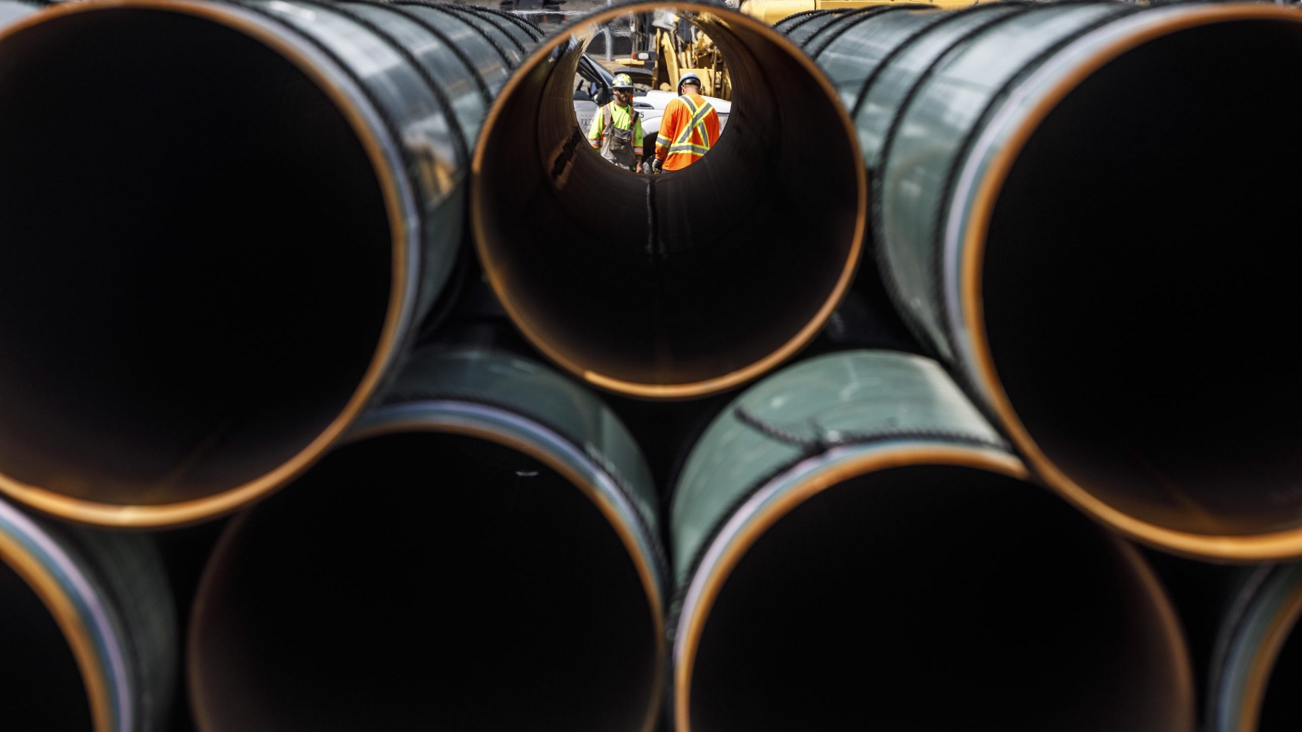Pipe for the Trans Mountain pipeline is unloaded in Edson, Alta. on Tuesday June 18, 2019. The Canadian Press