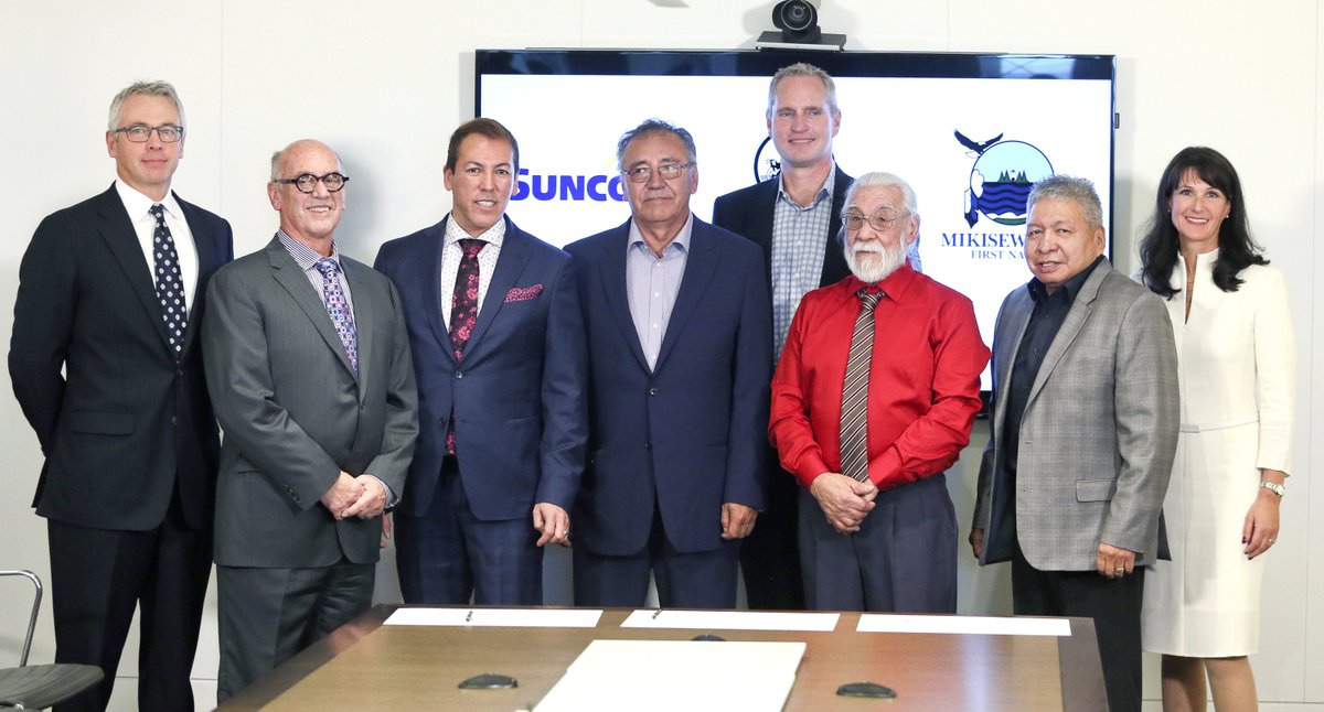 Representatives from the Mikisew Cree First Nation, Fort McKay First Nation and Suncor Energy announce the completion of the First Nations’ acquisition of 49% ownership of the  company’s East Tank Farm. Photo courtesy Suncor Energy