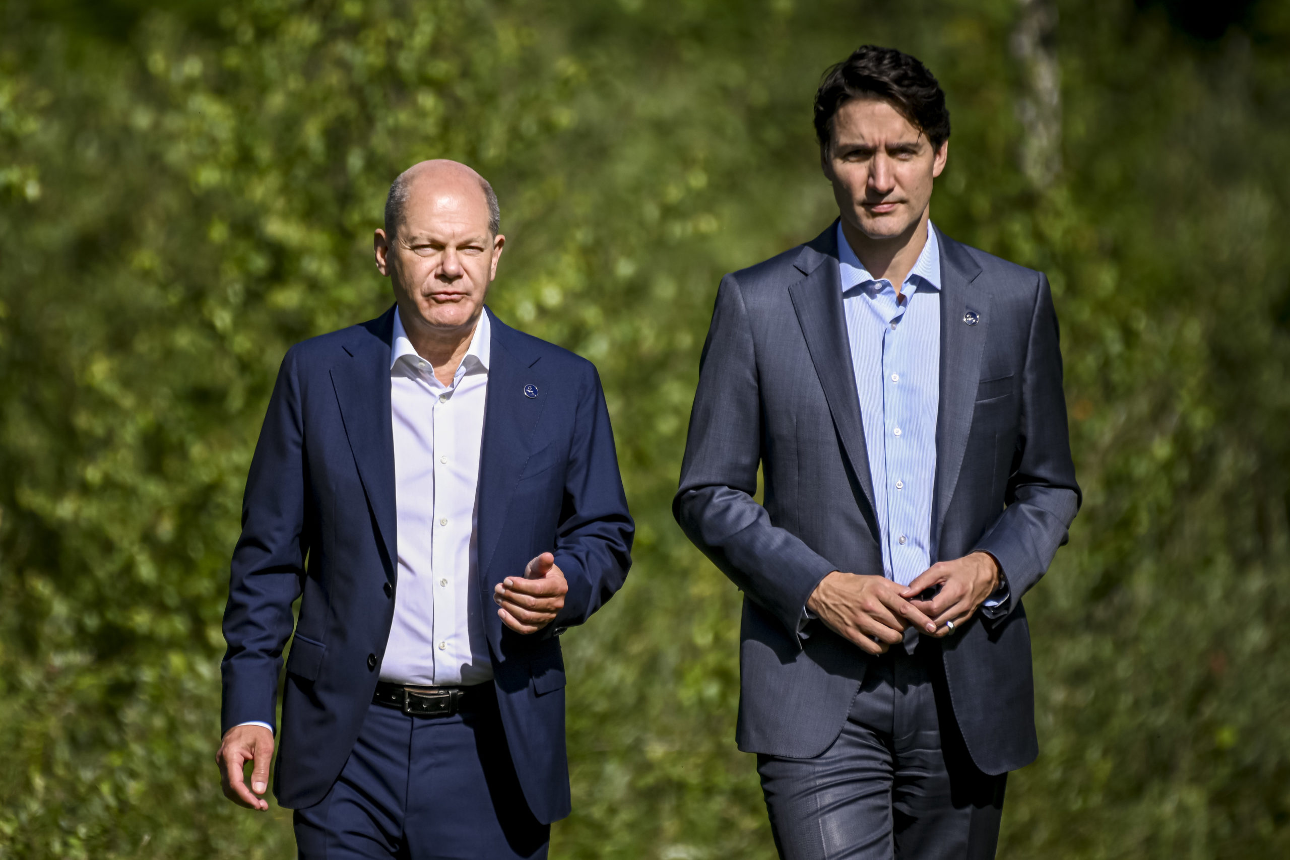 German Chancellor Olaf Scholz (L) talks with Canada's Prime Minister Justin Trudeau (R) during a walk on the second day of the three-day G7 summit at Schloss Elmau on June 27, 2022 near Garmisch-Partenkirchen, Germany. Getty Images photo