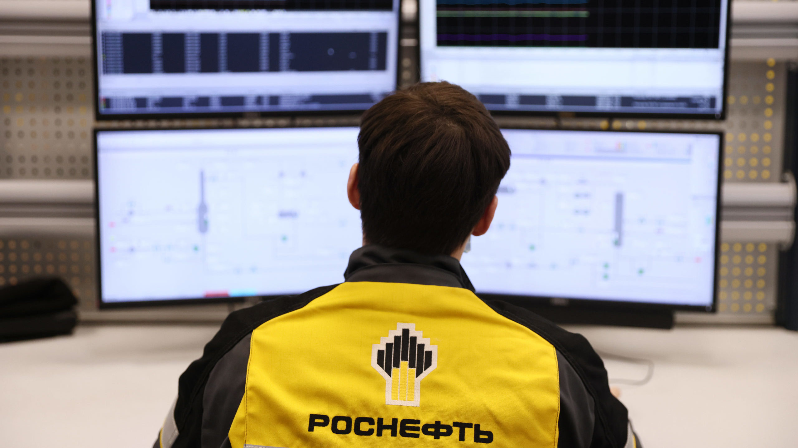 An employee works in a control room at Rosneft's Novokuibyshevsk Refinery. Getty Images photo