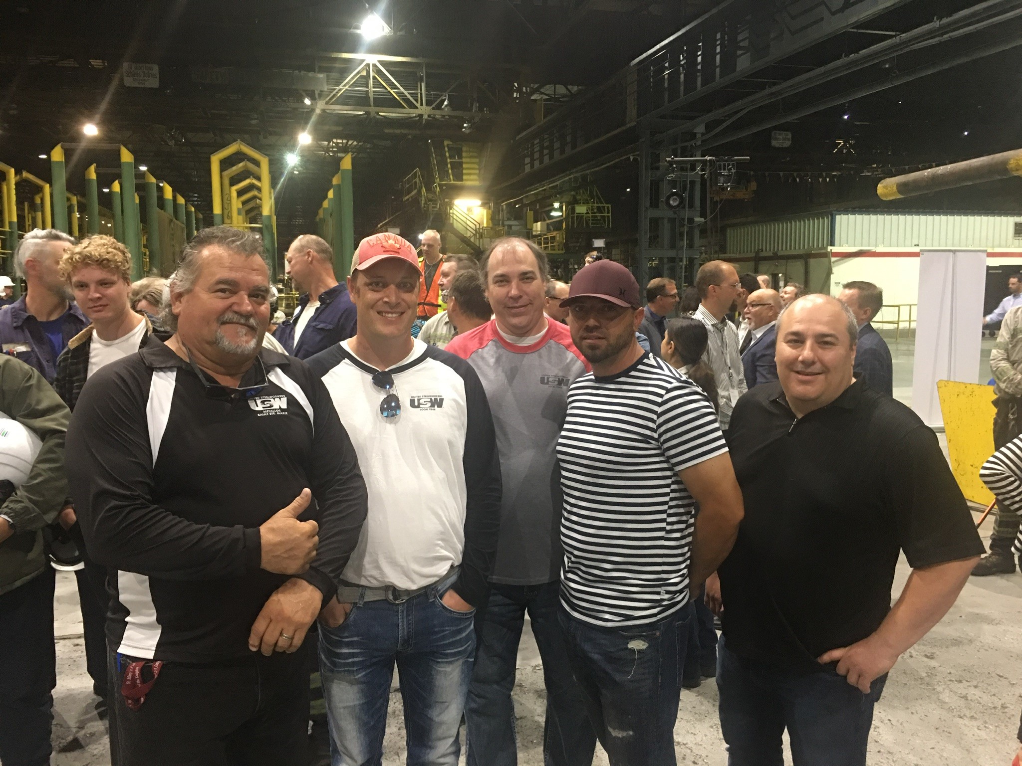 United Steel Workers Local 9548 executive members stand alongside workers at the Tenaris Algoma Tubes steel pipe mill in Sault Ste. Marie, Ontario prior to the COVID-19 pandemic. Photograph supplied for Canadian Energy Centre