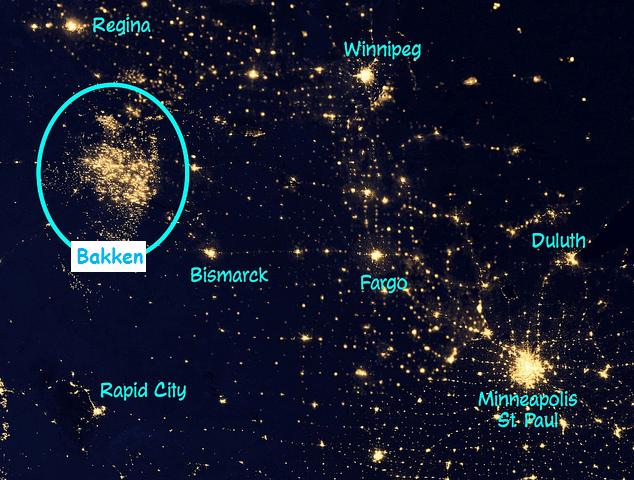 A satellite image of gas flaring in the Bakken oil play of North Dakota in 2013. Photo courtesy peakoil.net