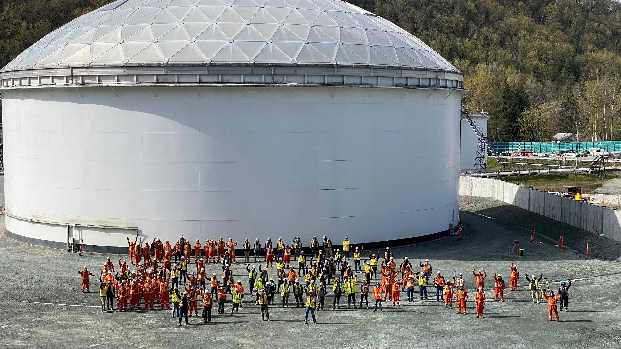 Trans Mountain Expansion workers celebrate the completion of Tank 104 at the project's Sumas Terminal. Photo courtesy Trans Mountain