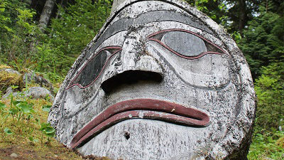Totem pole and shield, located a short walk into the forest, close to the Haisla harbour. Photo supplied for Canadian Energy Centre