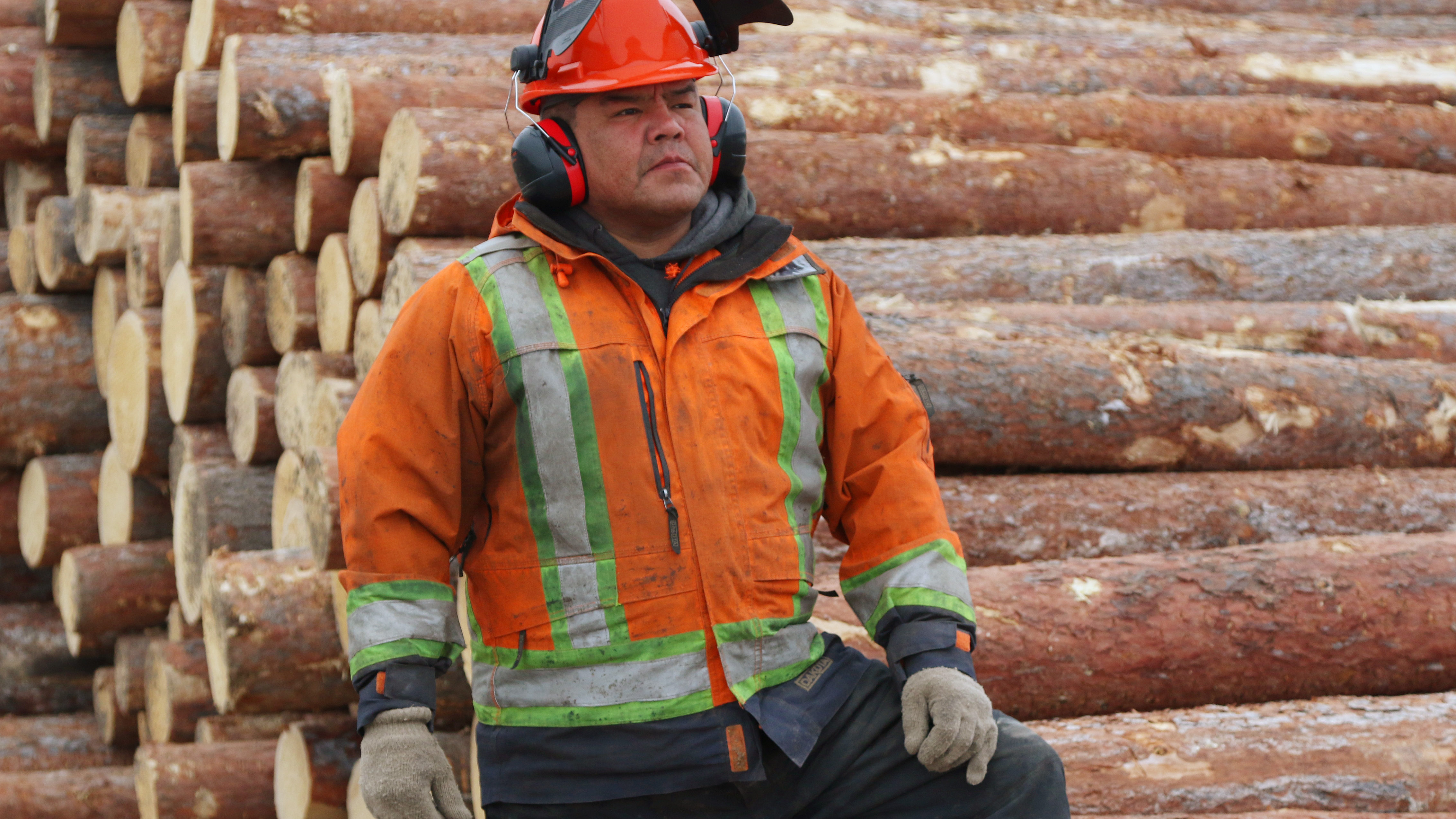 Shawn Prince, an Indigenous employee of Duz Cho works on tree clearing in the Peace River district for the Coastal GasLink pipeline in 2020. Photograph for Canadian Energy Centre